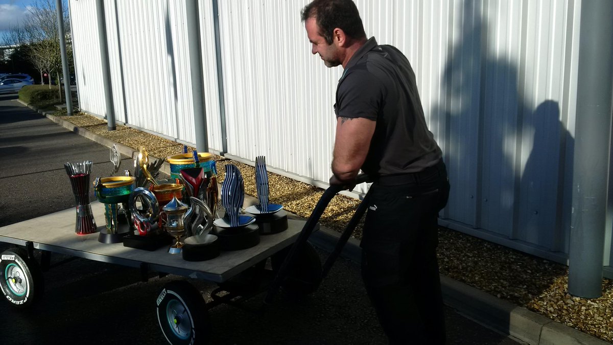 MercedesHouseBe's tweet photo. Winning a lot: @MercedesAMGF1: There seems to be a bit of a trophy haul going on: Literally,what's going on here? #F1 http://t.co/j8Gbk2GTCl