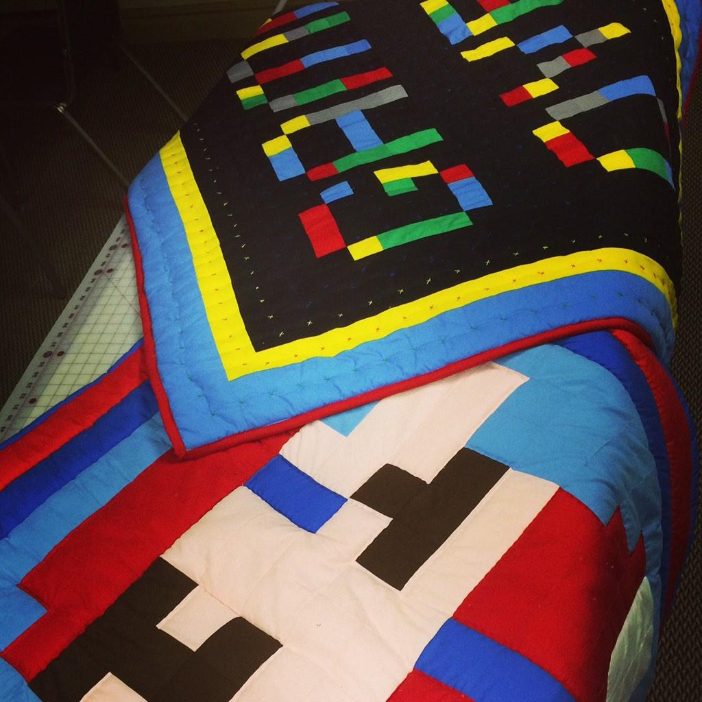 PaulHill_io's tweet photo. Check out these #CodeCamp14 quilts #BringYourGenius in 2 days! http://t.co/XppfOt5UiQ