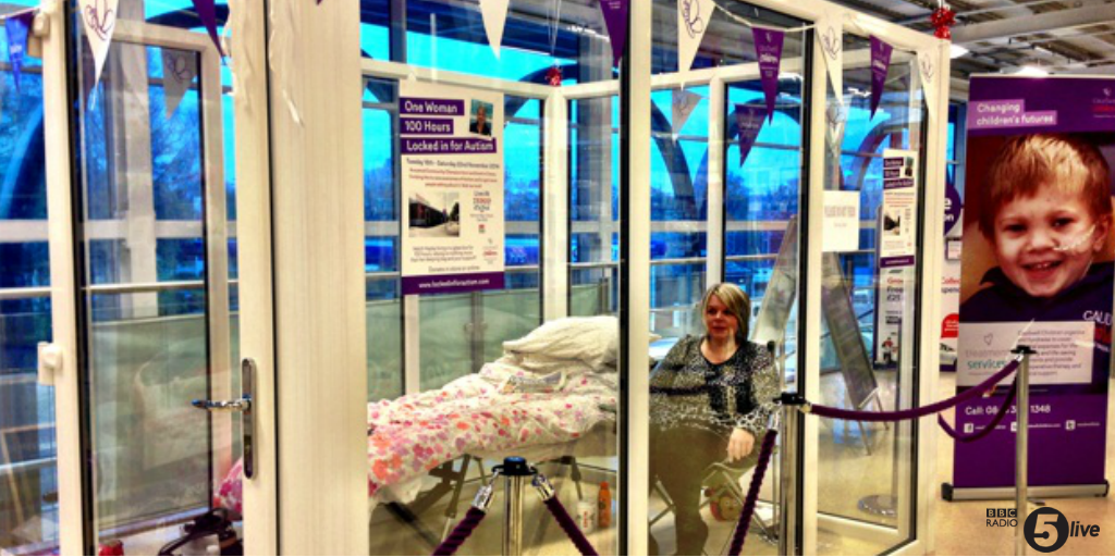 bbc5live's tweet photo. Shop worker Hayley has locked herself in a glass box for 100 hours to raise awareness of how people with #autism feel http://t.co/Y4pp6vDgID