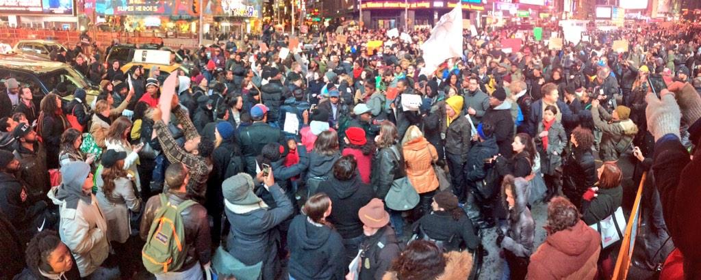 Lukewearechange's tweet image. #EricGarner time square is flooded with protesters right now, groups are converging and it's still early