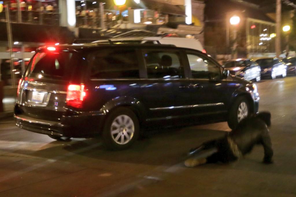 PDPJ's tweet photo. Frantic scene in CWE, man in minivan hits protesters, flashes gun at protesters who surrounded his car #Ferguson #stl http://t.co/aVuwwLRUFP