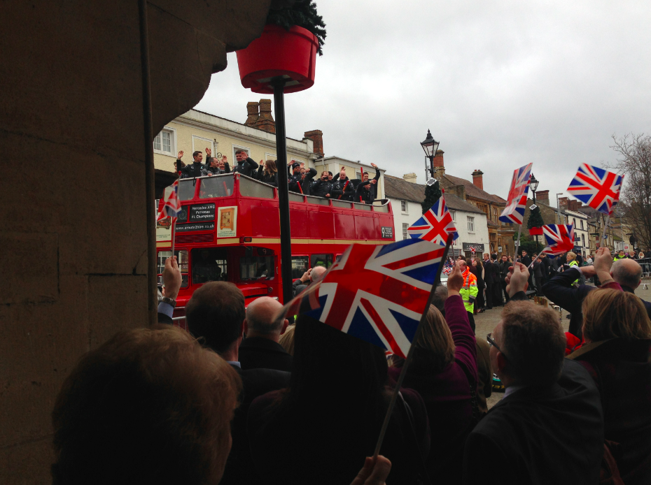 HendrixMedia's tweet photo. What a fantastic atmosphere! @MercedesAMGF1 team en route to Brackley Town Hall. @_NorthantsEP @SNorthantsC http://t.co/Zrd116hyoy