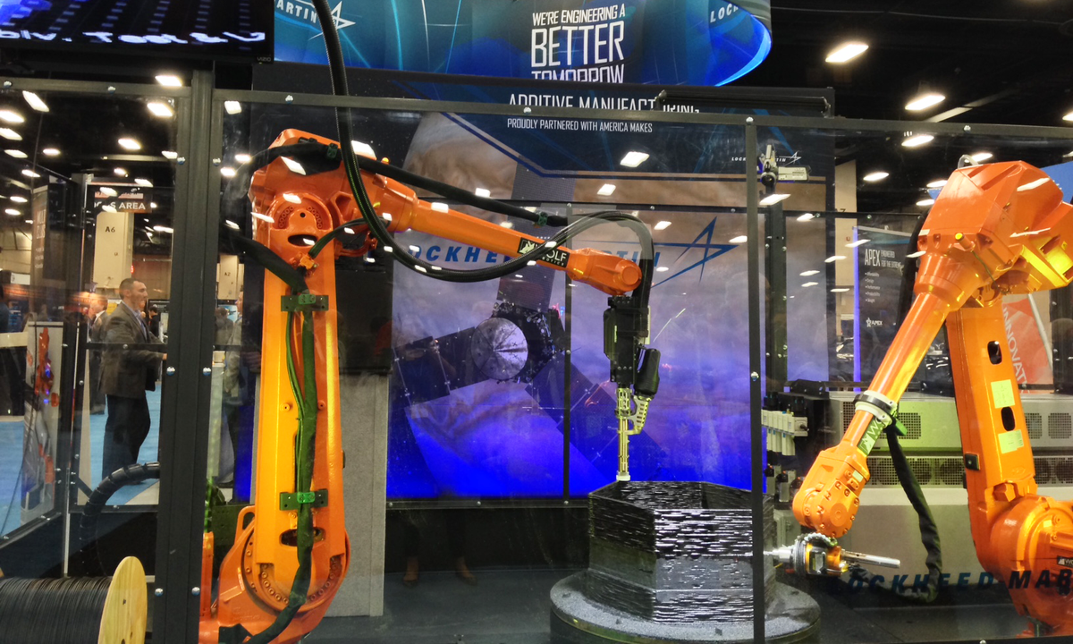 LockheedMartin's tweet photo. #Additive robots do work! See how we're transforming #manufacturing for tomorrow: http://t.co/CL49wUY3a8 #DMC2014 http://t.co/gXlgRQTZ65