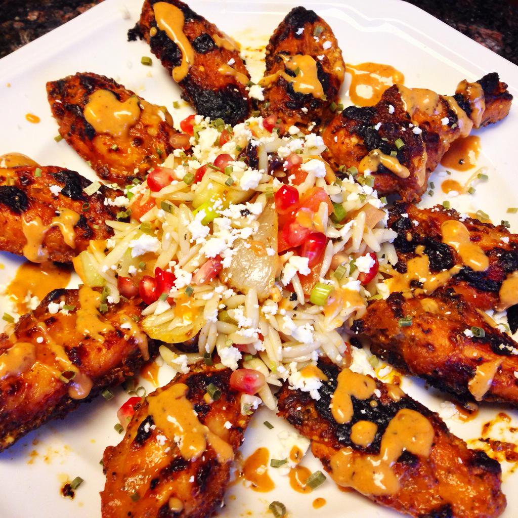 RemyMaaddi's tweet photo. I'm pretty sure I make the most intense wings ever lol. Paired it w orzo salad w fennel and pomegranate. #DivaCook http://t.co/y8GAYmMhSP