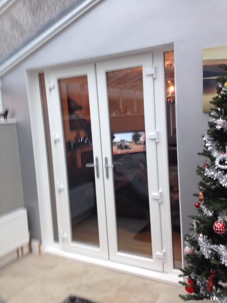 Rehau French doors with minimum sized side lights