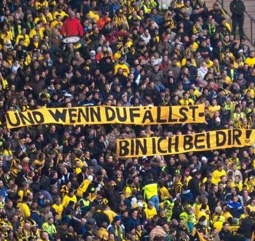 RemarksFootball's tweet photo. Dortmund fans with a message to their team. 'And if you fall I’m with you' http://t.co/p1NmlOktRd