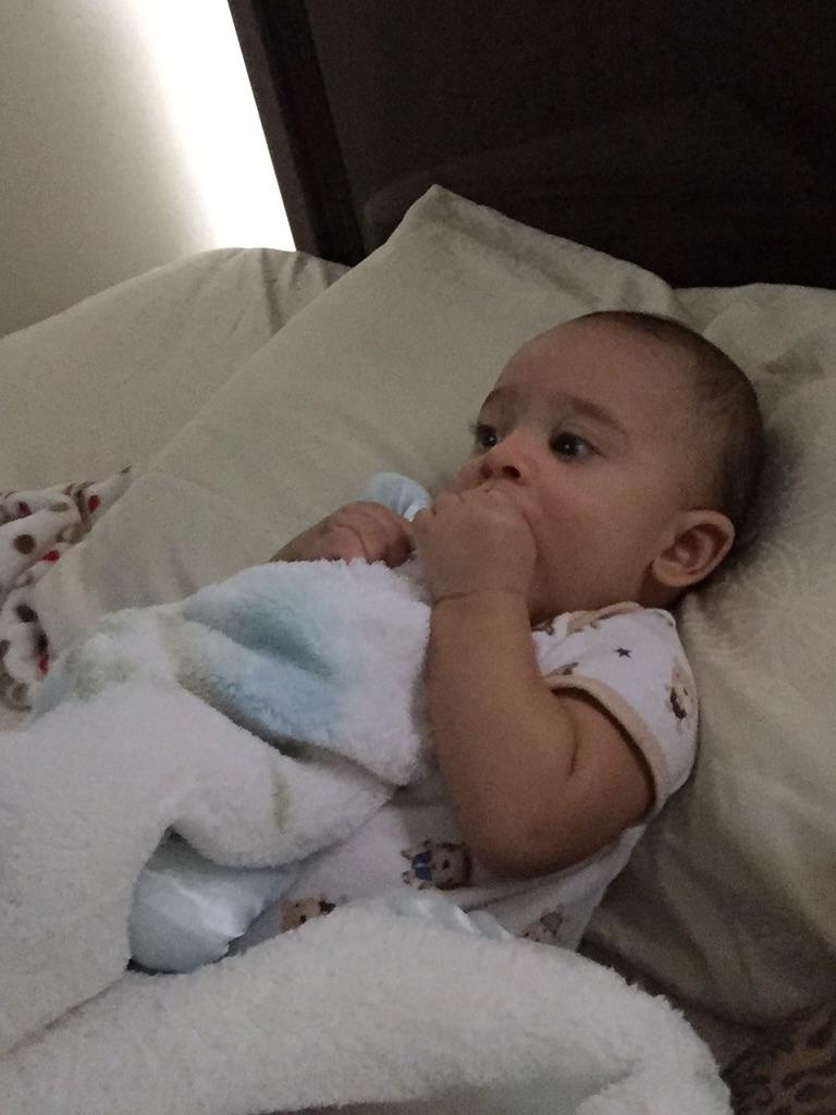 Laying down next to my lil muffin😍