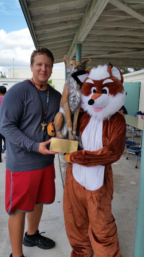 FlagamiSchool's tweet photo. Our awesome Coach Almeida with Mr. Fox showing off Flagami's Field Day Trophy. #keepingkidsfit http://t.co/eY4OiIkvMK