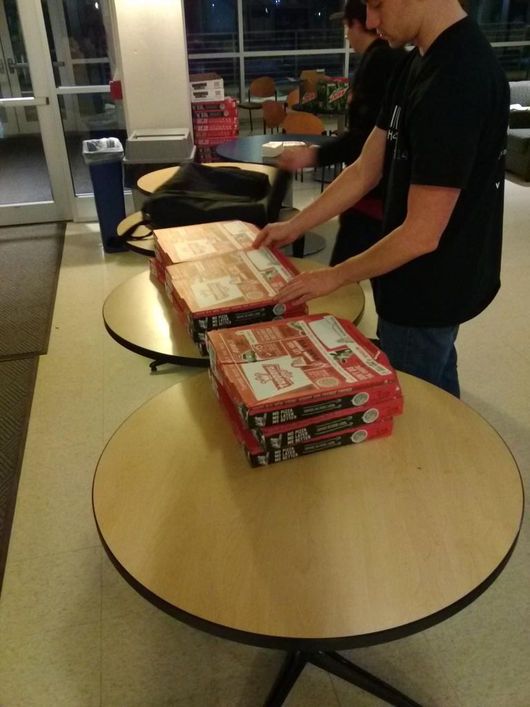 Javalinos's tweet photo. More pizza has arrived #Javalinos #UWWHackathon14 http://t.co/UPH2zYGFqe