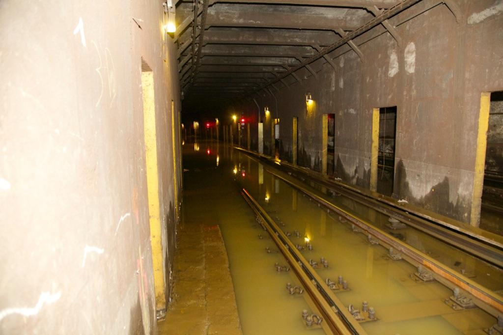 NYCTSubway's tweet image. #SubwayNews Tracks visible near E.143rd St after pumping operation  to clear roadbed following water main break