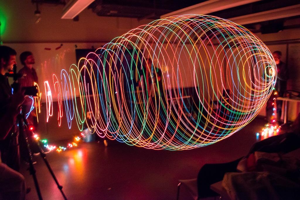 exploratorium's tweet photo. Ending our #TeachNGSS conference on a festive note! Teachers use mini string lights to explore light &amp; motion. http://t.co/1suFa4xkJU