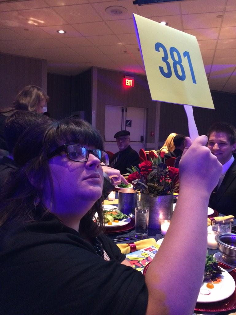 RespectTheT's tweet photo. Who gave this crazy lady a bidding paddle? #theregoesthe401k #ctfbenefit http://t.co/ekJijXUZsb
