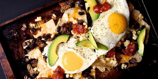 Refinery29's tweet photo. Um...the best thing to ever happen to mornings? Breakfast nachos: http://t.co/Wo11lvPmbC http://t.co/tfnZvjvQ32
