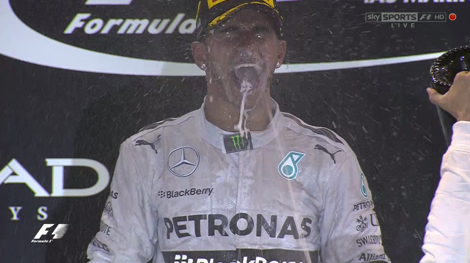SkySportsF1's tweet photo. Huge celebrations from Hamilton on the podium. A victory to end a great season for him. #SkyF1 #AbuDhabiGP http://t.co/bV9IRZKQk9