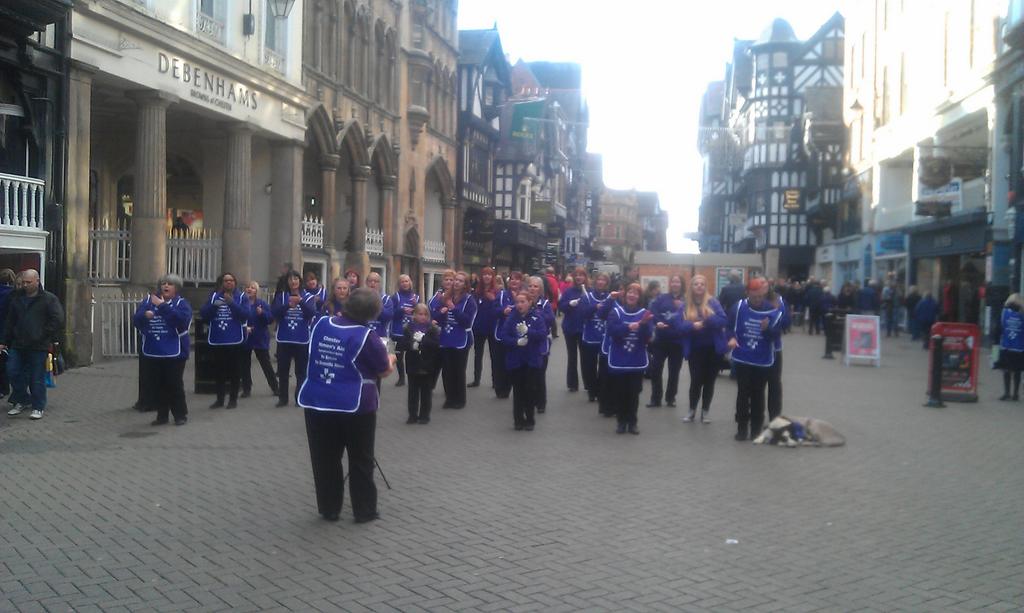just_emmma's tweet photo. Dee Sign Choir in Chester helping out for Chester Woman's Aid for their White Ribbon Day against domestic violence.. http://t.co/28u3UTTs9G