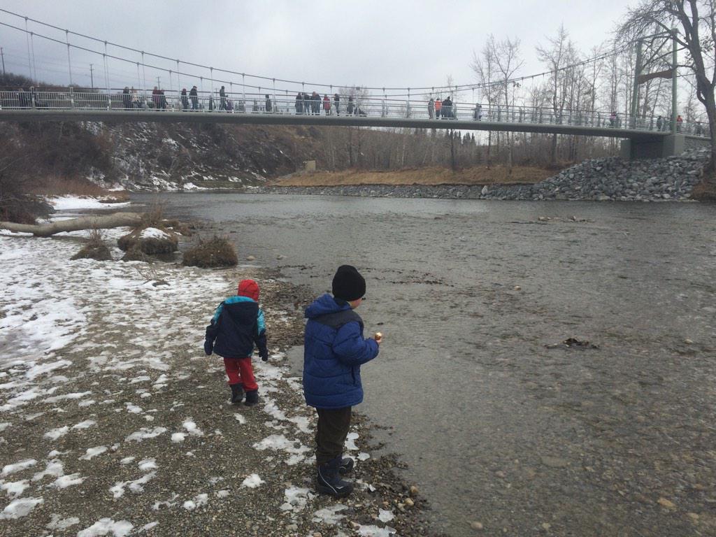 awesome! RT <a href="/robdickinsonAB/">Robert Dickinson</a>: Bridge in use and kids playing at the river.