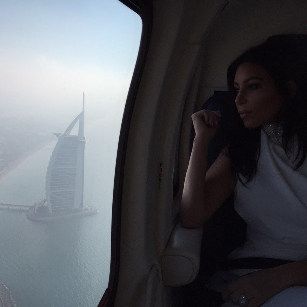 KimKardashian's tweet image. Earlier today helicopter ride to the desert over looking Burj Al Arab