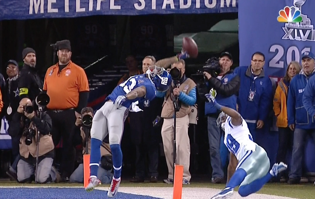VIDEO: Odell Beckham, Jr. reaches way back for a 1-handed TD catch while getting dragged down ble.ac/1pdqqOo