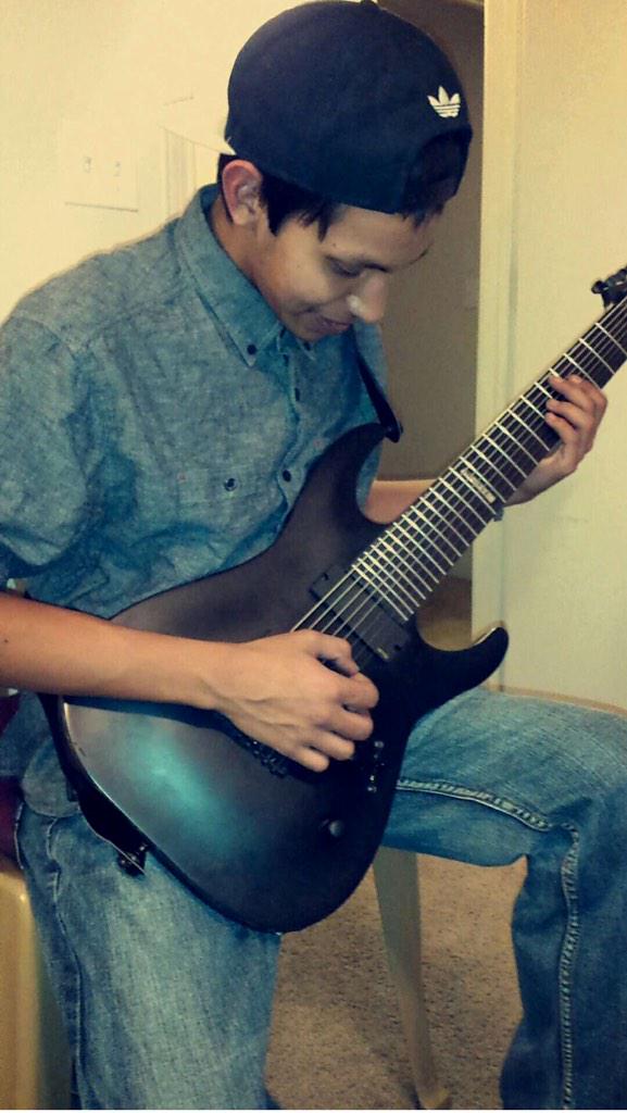 Yazzie929's tweet image. Jamming on the 8 string #Guitar #EightStrings #Jamming #DropThatE #GirlsWithTattoos #RandomHashtag