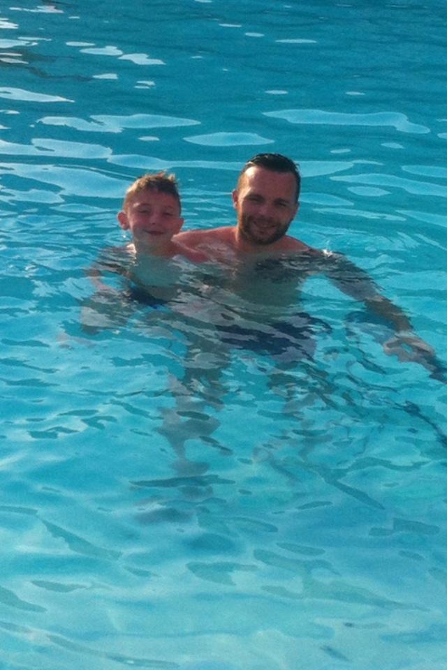 wayneb960's tweet image. Me and little man chilling in pool happy days