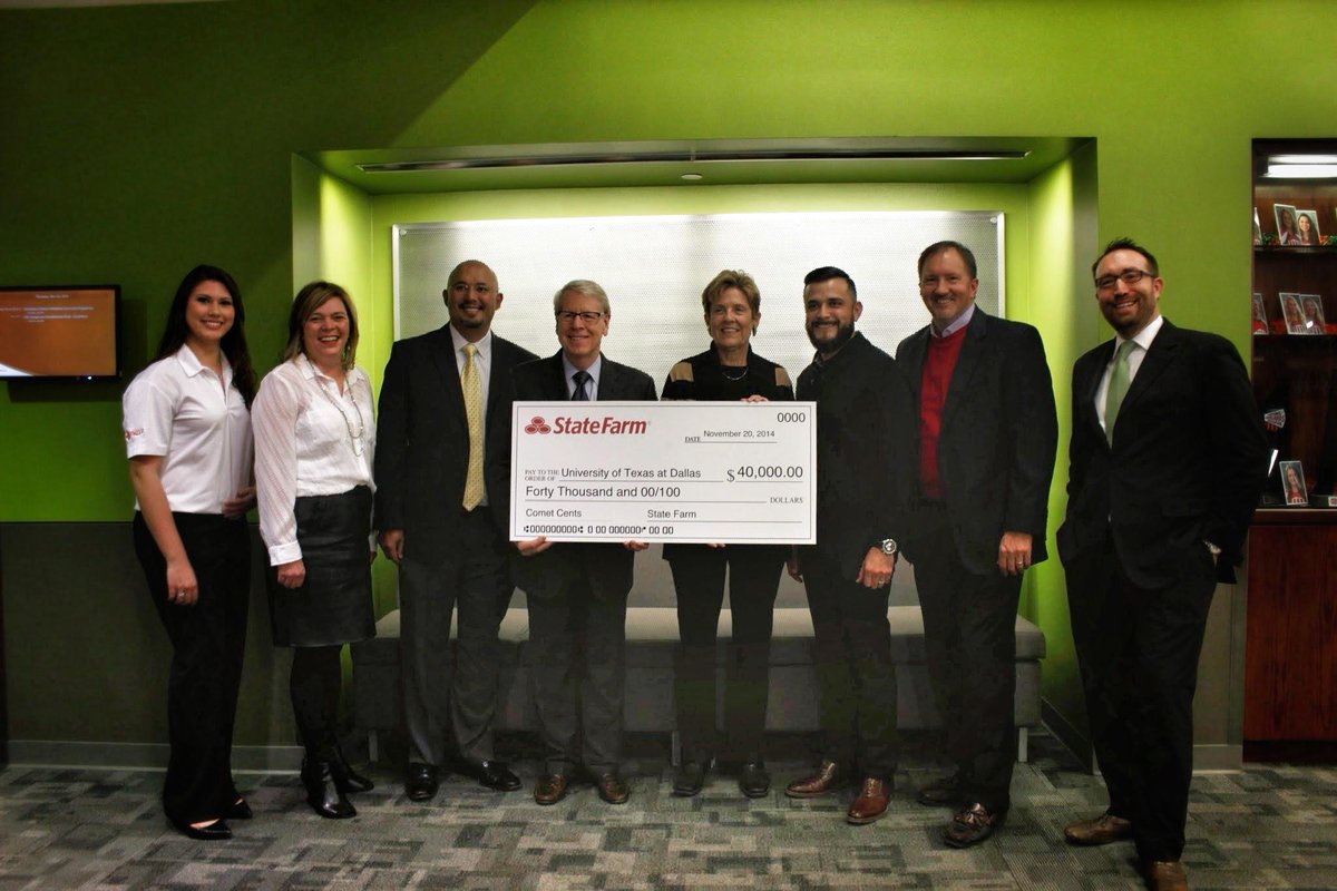 jindal_utdallas's tweet photo. ICYMI: #UTDallas president Dr. David Daniel stopped by the @CometCents workshop to accept the @StateFarm donation http://t.co/l1zs6cDcZd