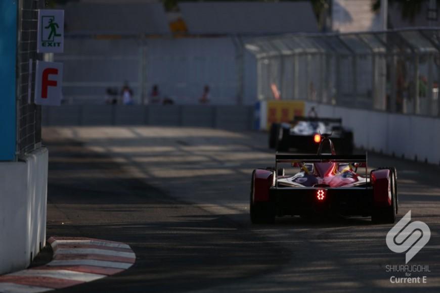 Current_E's tweet image. Deep red livery in the early morning sun. current-e.com/features/putra… @ChinaRacingFE #RinggitRing #FormulaE