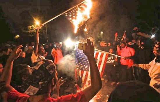 TheWOTTaBoy's tweet photo. Thats right #Ferguson burn the flags of the country you all rely on....This is disgusting http://t.co/1bKvN4MRbm