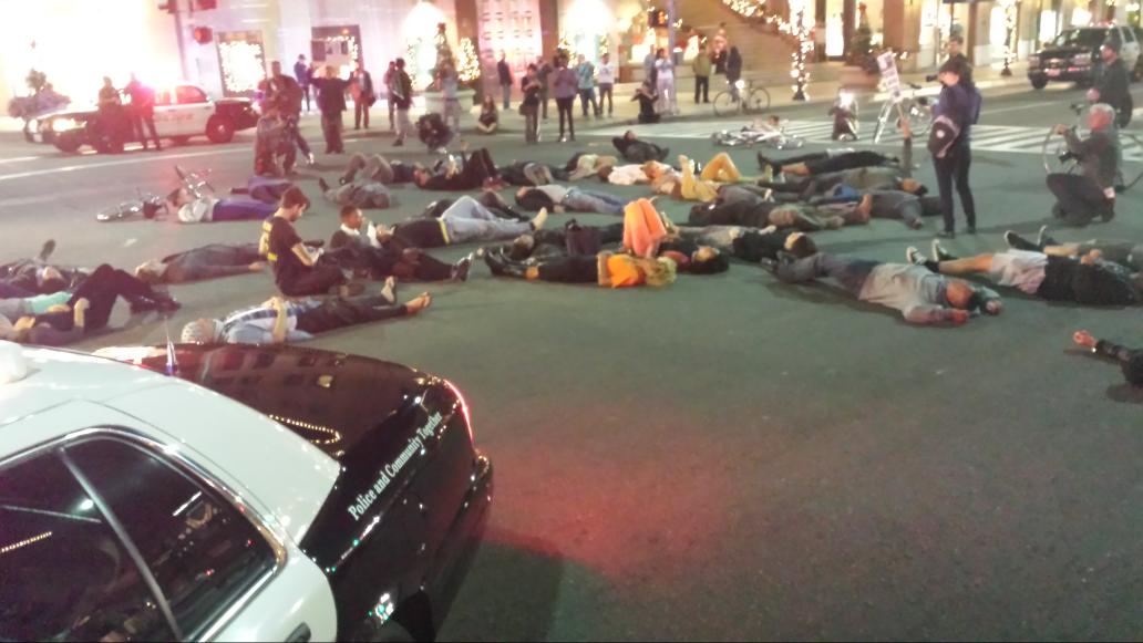 via <a href="/SteveKuzj/">Steve Kuzj</a>: #Ferguson protesters lying in middle Rodeo Drive, playing dead for #MichaelBrown #LosAngeles