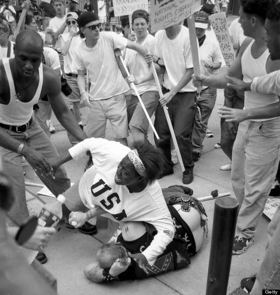 crankdatholly's tweet photo. an 18 year old african american girl shields a kkk member with her body to protect him from being beaten by a crowd http://t.co/izZXdcxRUa