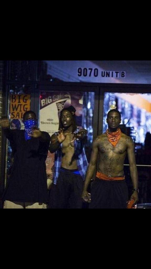 femmetron's tweet photo. RT @UndrgrndMedia: WHAT THE NEWS WONT SHOW: 2 CRIPS and a BLOOD together preventing people looting this shop http://t.co/e4yU902sbD