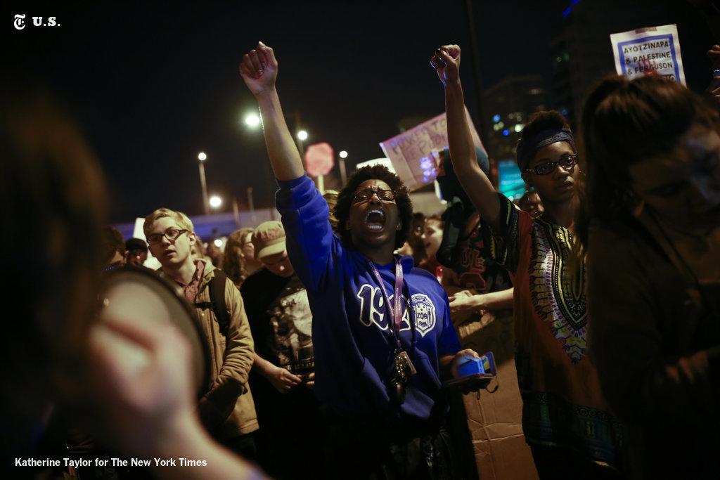 nytimes's tweet photo. Photos: Protests in Ferguson and across the country http://t.co/UR88krtYA4 http://t.co/vsz8CJCoqu