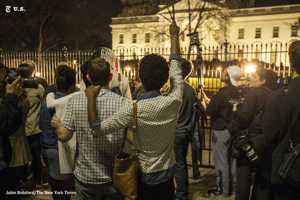 nytimes's tweet photo. Photos: Protests in Ferguson and across the country http://t.co/UR88krtYA4 http://t.co/vsz8CJCoqu