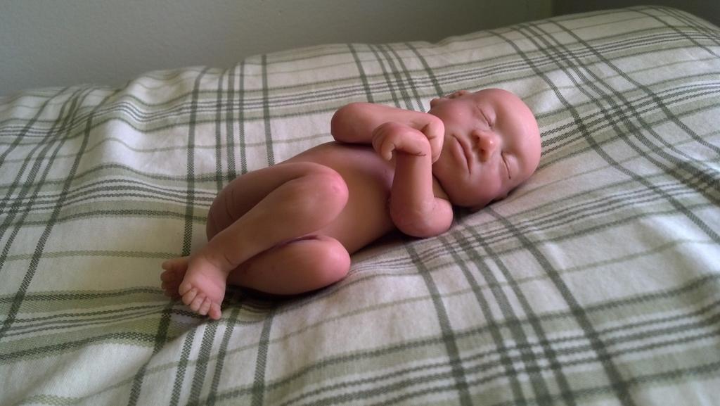 Hot_Metal_Momma's tweet photo. First attempt at a realistic infant sculpture. How cute is that nose though?? http://t.co/26eKYX9Chh