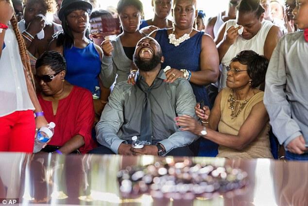 BET's tweet photo. This morning, our hearts are heavy for the family of Mike Brown and the city of Ferguson. #BlackLivesMatter http://t.co/vz2awTypJb