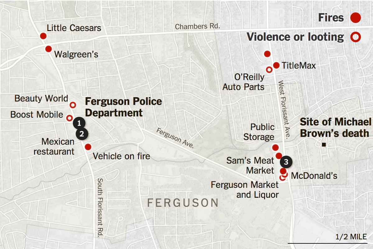 NYTNational's tweet image. At least a dozen buildings were set on fire around Ferguson after the grand jury decision nyti.ms/1vcKMqG