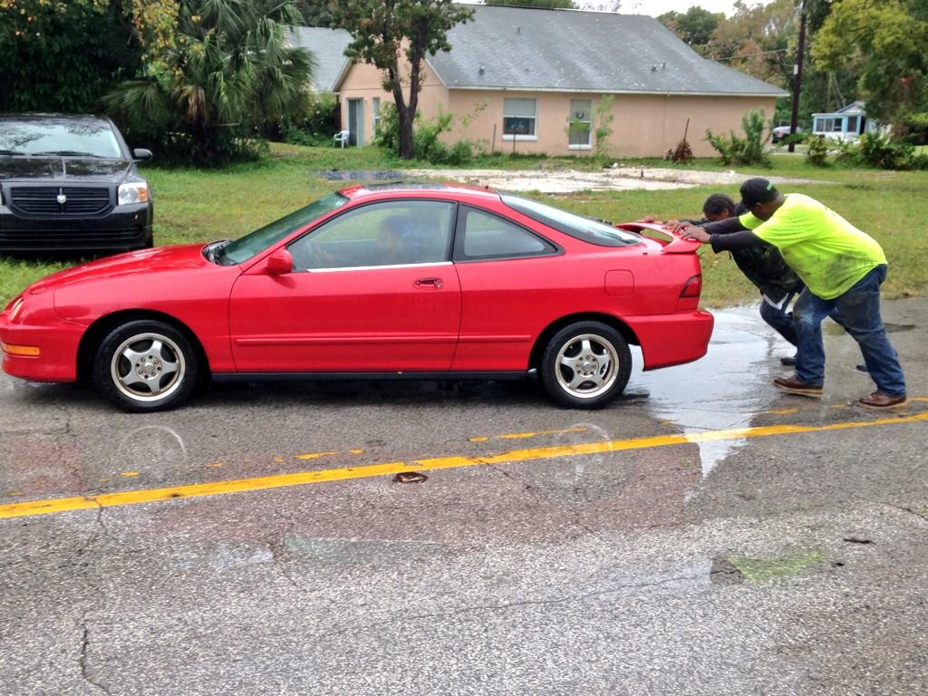 RikkiKlausWESH's tweet image. PHOTOS: 1) Corvette started, finally. 2) Water on floorboard. 3) Tony &amp;amp; Thearl pushing stranded car. #WESH2Storms