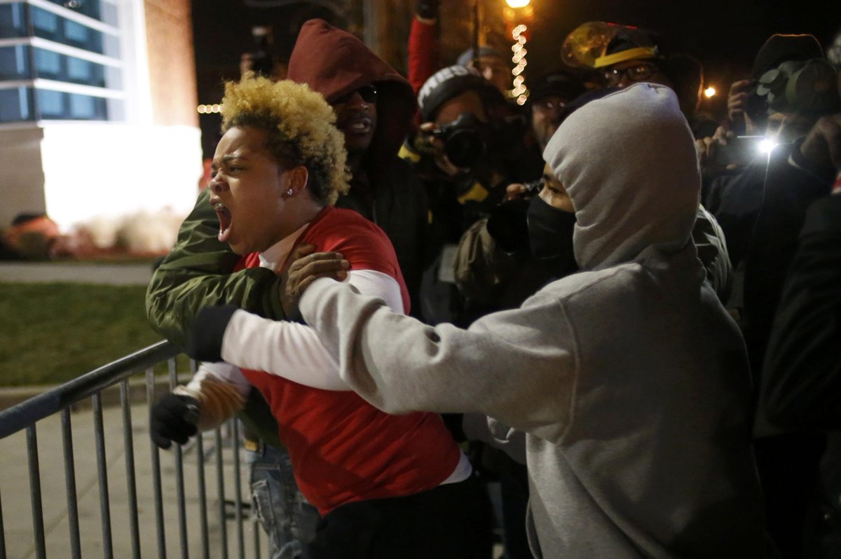 Newsweek's tweet photo. These photos of reactions to #FergusonDecision echo the civil rights protests of the 1960s — http://t.co/jMiHQSk6nO http://t.co/R5Mykm5BnL