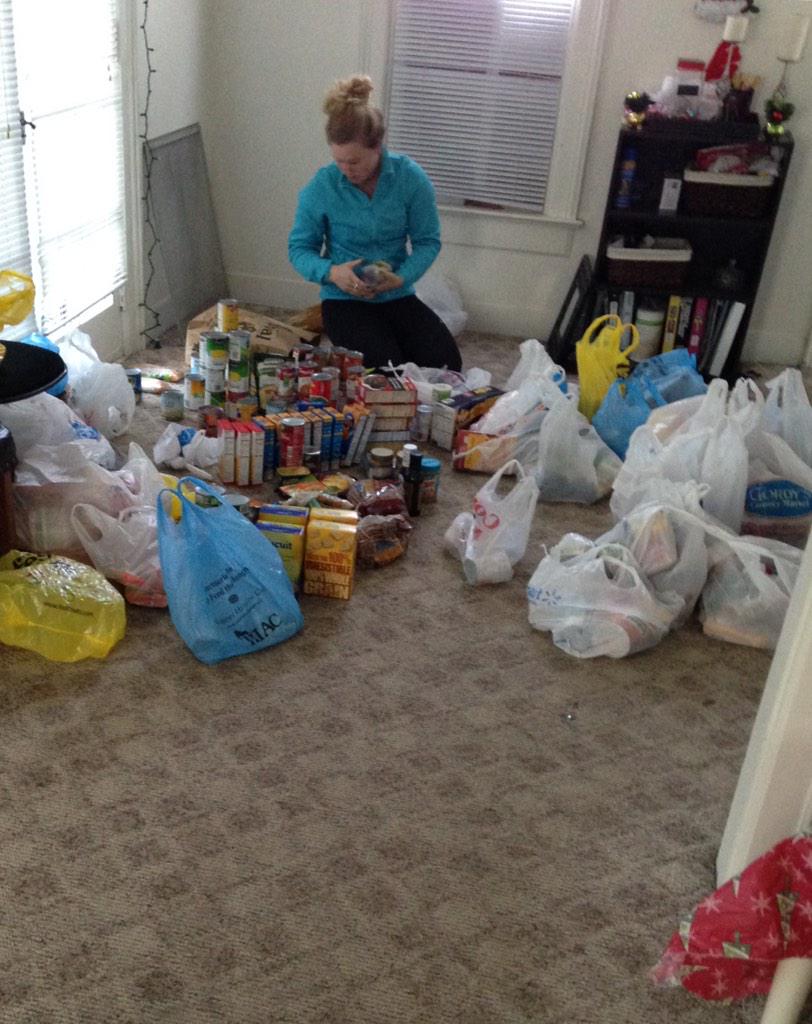 UWECSAAC's tweet photo. Organizing our donations from the food drive! We will be donating to the campus food pantry. Happy Thanksgiving! http://t.co/SXvLiO97Or