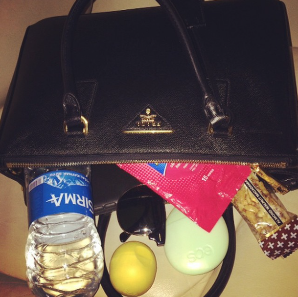 ddlovato's tweet photo. Travel essentials with @eos 👜💄💋 http://t.co/ne6FjkONhP