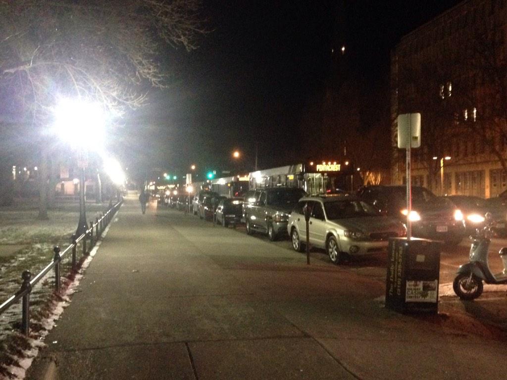 RebeccaMorin_'s tweet photo. UI busses, Iowa City busses, and a Coralville bus is being blocked by protestors. #Ferguson #ic2ferguson http://t.co/4CmQtyoTzj