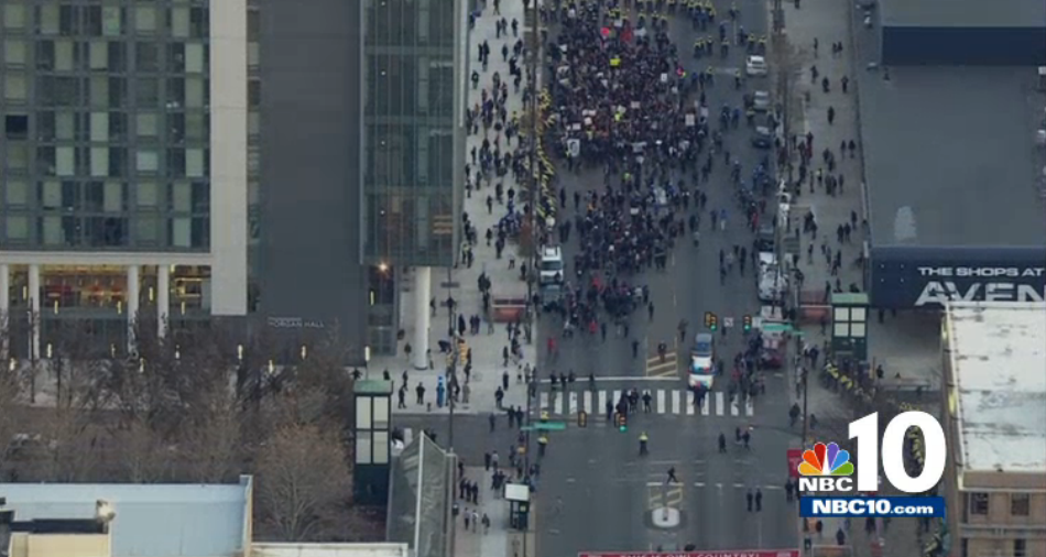 NBCPhiladelphia's tweet photo. LIVE COVERAGE: #FergusonPHL protesters have reached Temple University. Rallying on Broad St. http://t.co/AkbwMqceQO http://t.co/shPNHaLHD9