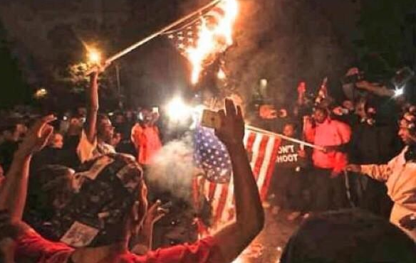 CauseWereGuys's tweet photo. I don't care what side you agreed with on the Ferguson Trial... No American should act like this. http://t.co/Bl7CvsdKu4
