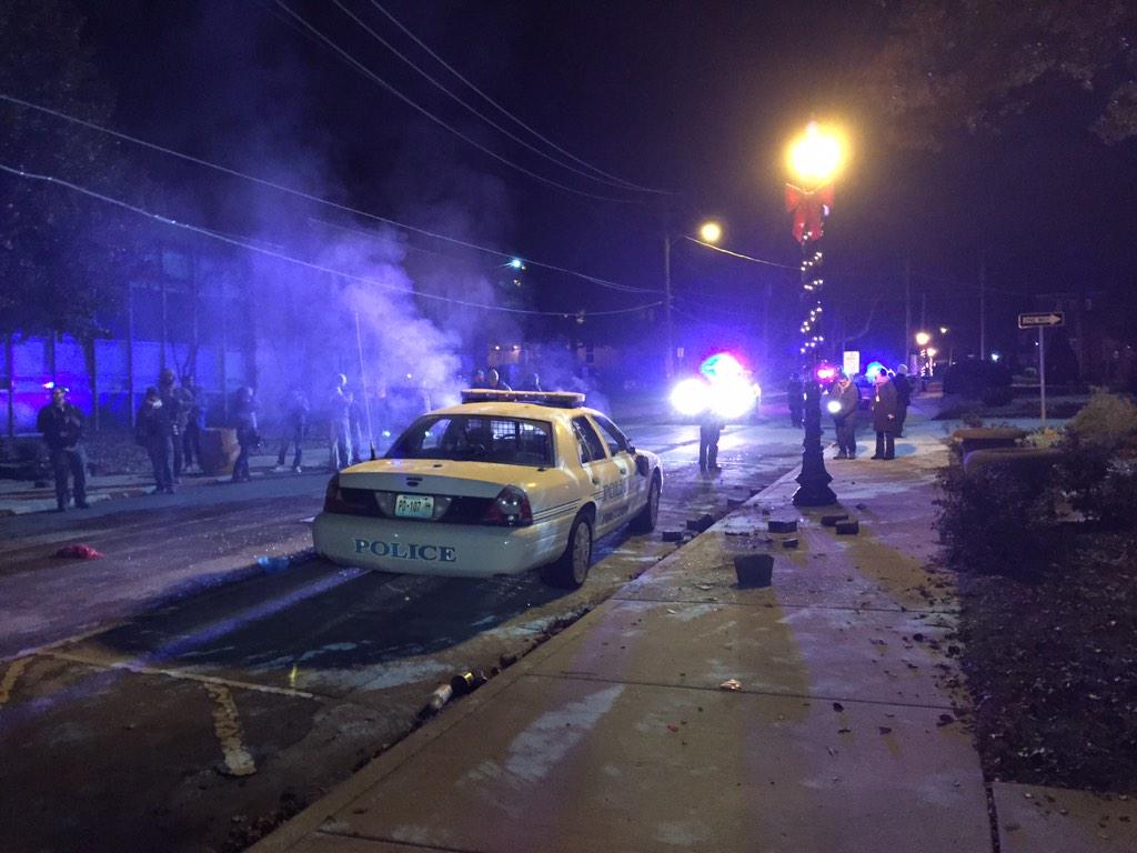 The scene at city hall. Smoke bombs, flares shooting, and tear gas.
