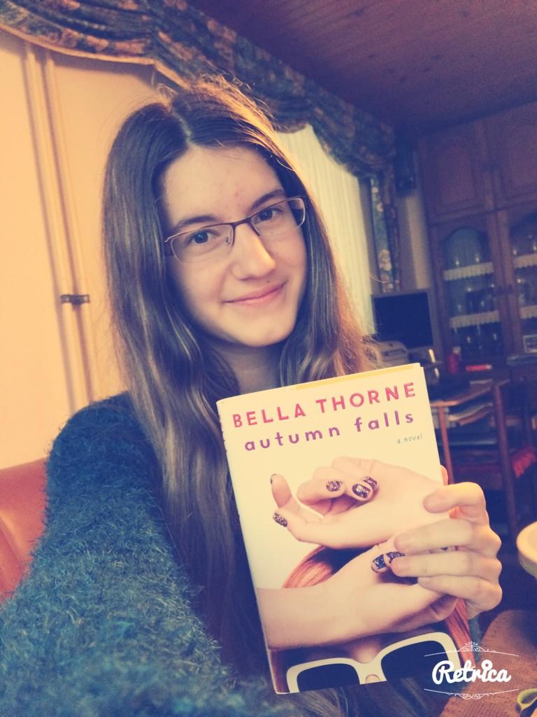 spaceylux's tweet photo. please ignore my face and focus on the book 😍❤️ #AutumnFalls http://t.co/GvYr2qRsYT