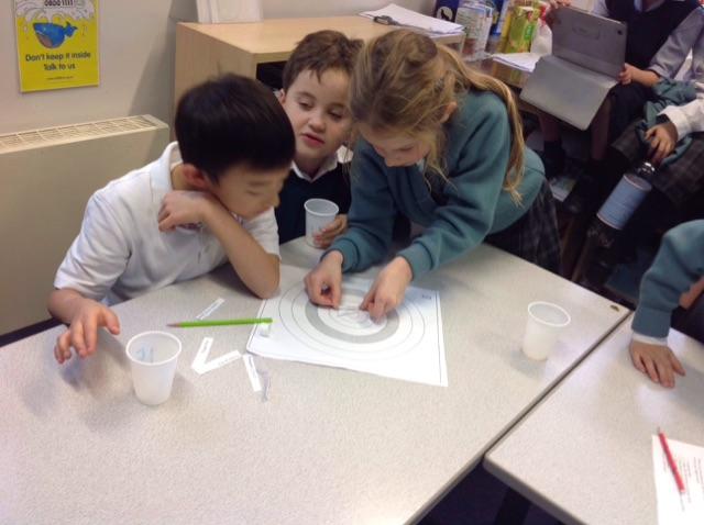 SPFJuniorSchool's tweet photo. Y3 judges @SPFSchools are hard at work evaluating Y4 DT project. P4C skills in action #targetboard http://t.co/u2uBc97Gct