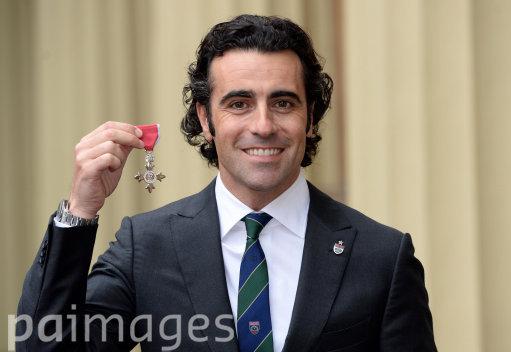 JensonButton's tweet image. 👍 RT @RoyaleVision: Racing driver Dario Franchitti holds his MBE after the Investiture ceremony at Buckingham Palace