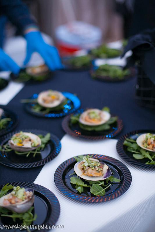 Grilled cherrystone clam - meyer lemon vinaigrette - guanciale - gremolata - pickled cucumber #clams