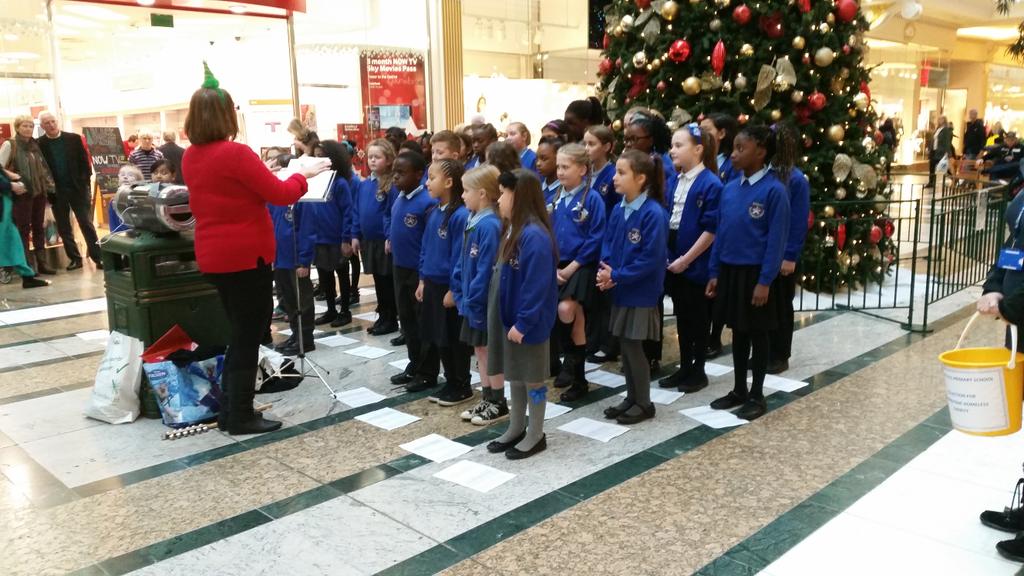 codlingblood's tweet photo. Mill and molly singing in Trafford center http://t.co/wMQSg8hZjP