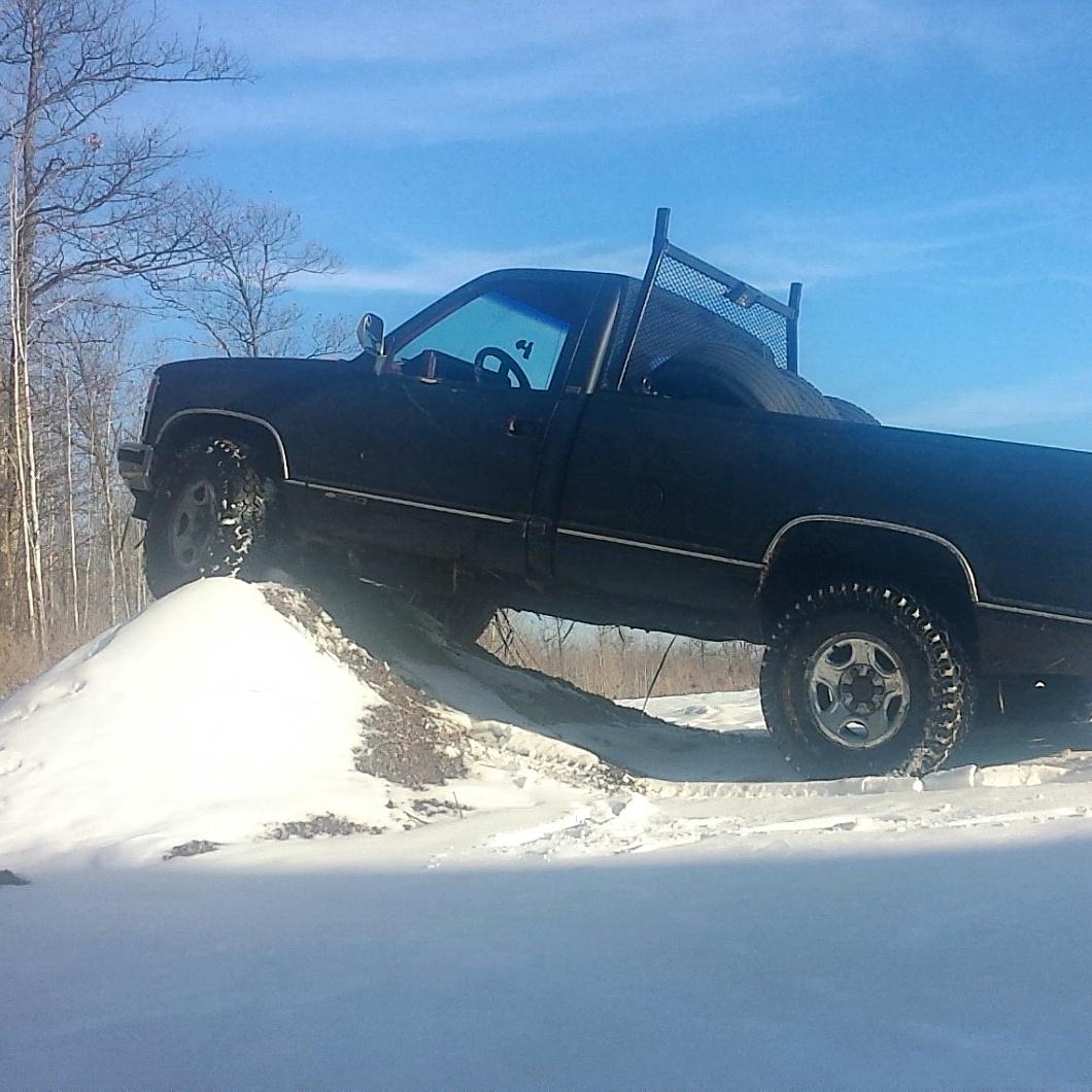YaBoyScottathan's tweet photo. I use to build snowforts and snowmen,  but this is how I play in the snow now! #4x4 #chevy #K1500 #offroadin http://t.co/DNEhhnMYBf