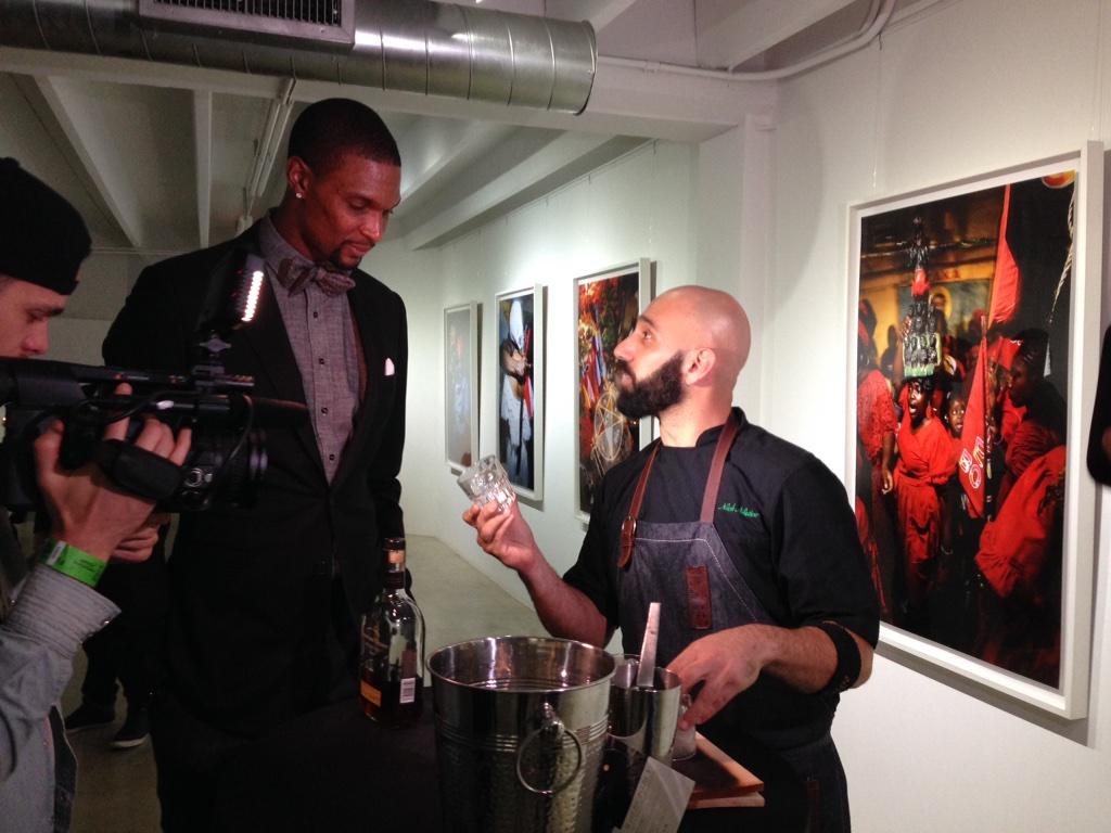 breakthrubevFL's tweet photo. Nick Nistico mixes up a "Mr. Nice Tie" for @chrisbosh! #BoshBasel @WoodfordReserve @misternicetie http://t.co/Uz6vDpQHOv